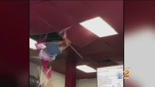 Woman Falls Through Restaurant Ceiling [upl. by Wallack427]