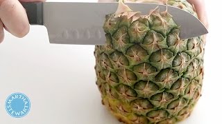 How to Cut Pineapple Wedges  Martha Stewart [upl. by Arimihc]