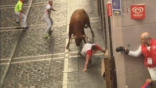 Pamplona Attack Watch as bull gores three runners [upl. by Palmira291]