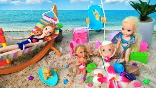 Annia and Elsia Toddlers Play in the Sand Swim at the Beach with Barbie and Chelsea Toys and Dolls [upl. by Gney]